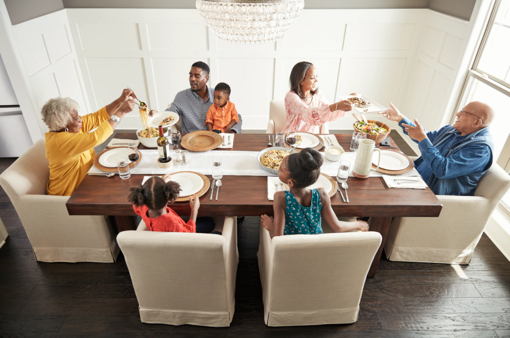 Family having breakfast at the dining table | BMG Flooring & Tile Center
